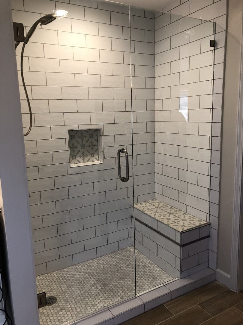 Please note the placement of the bench requires the glass to sit on its edge. We recommend extending the bench further over the curb.