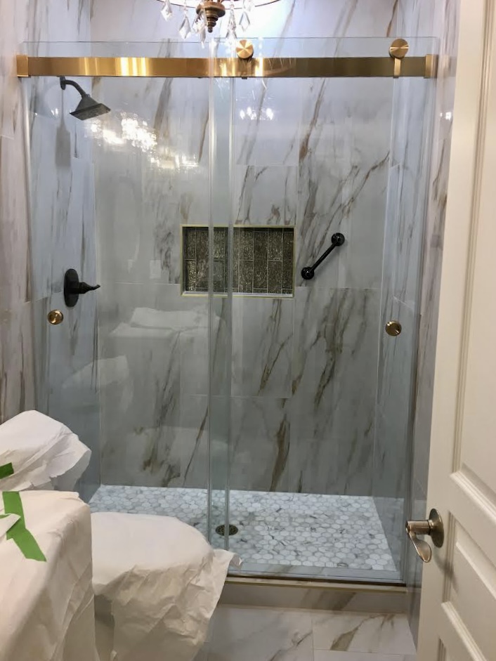 This Brushed Gold slider from Structure Glass Solution features an extra heavy duty slider bar which carries more weight than almost any other double slider in the industry! The hidden rollers on one side keep the look sleek and low profile but maximize the functionality. Ask us about this Element Series slider today!