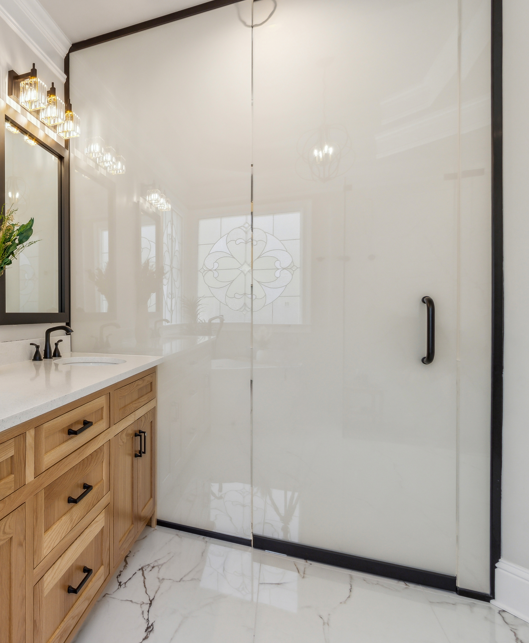 This is an electrified glass toilet partition which allows the homeowner privacy when needed but makes the space look large and open when not in use by becoming transparent. Read more about this on our blog!