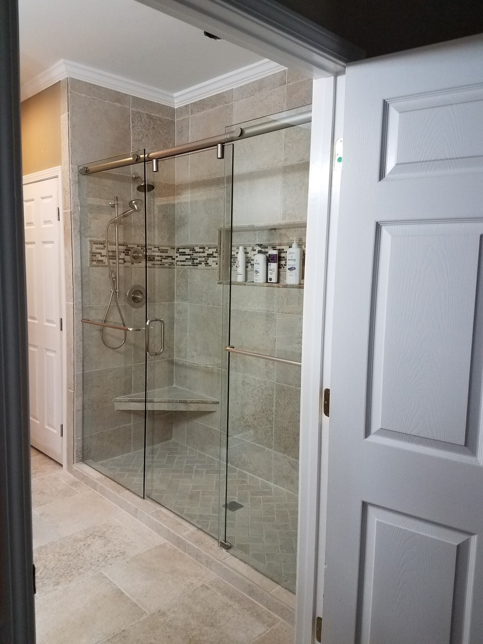 Hydroslide Shower Door. This is similar style as the Barn Door pipeline series except rollers are inside the bar. Sophisticated design and manufactured with quality.