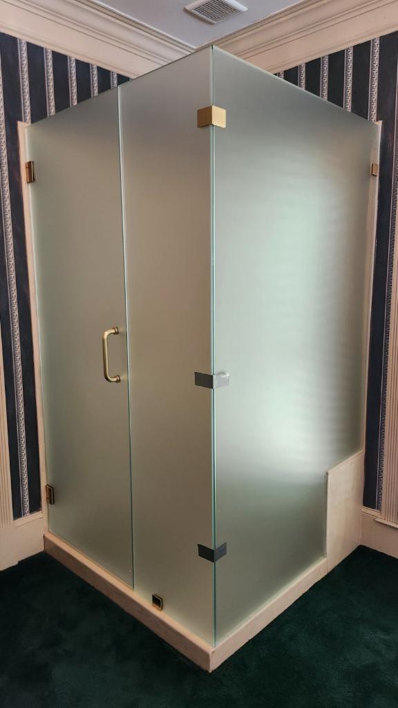 This frosted glass enclosure provides plenty of privacy for the user!